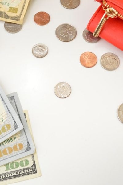 silver round coins and banknotes